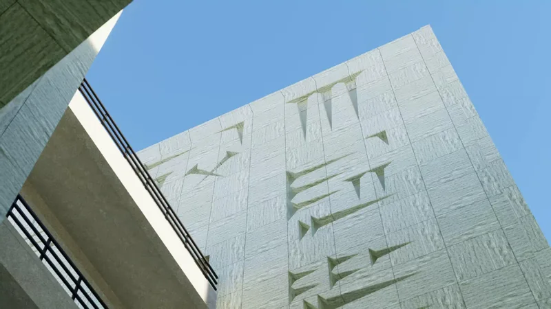Sculpted concrete façade and planted terraces seen from below