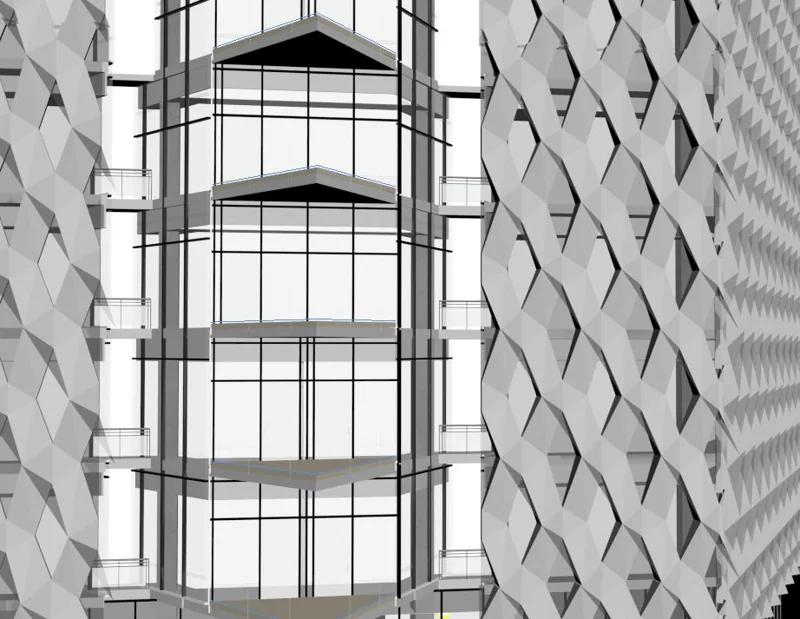 Monochrome architectural model showing a glazed building and geometric façade